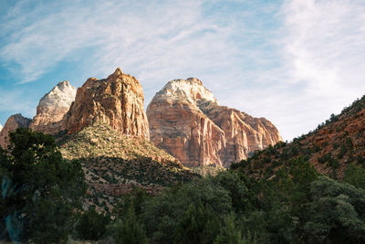 Panoramic view of rock formations on landscape against sky