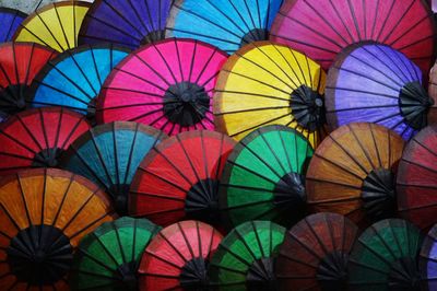 Low angle view of multi colored umbrellas