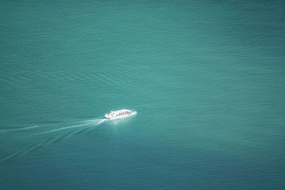 High angle view of sailboat sailing on sea