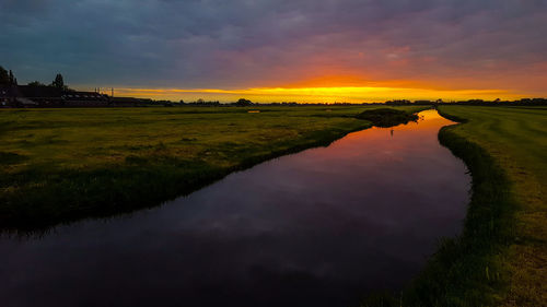 Scenic view of silhouette landscape against sky during sunset