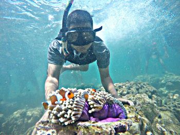 Man snorkeling in sea