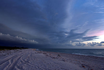 Storm clouds forming in empty beach at celestún, yucatán, méxico.