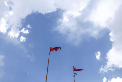 Low angle view of flag against sky