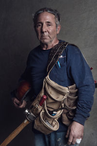 Construction worker with tool belt