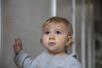 Portrait of cute boy looking away