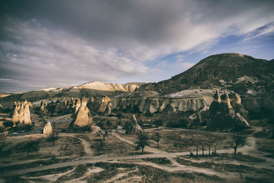 Panoramic view of landscape against cloudy sky