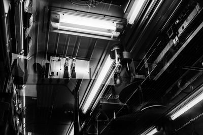 Low angle view of illuminated ceiling