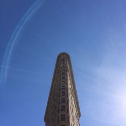 Low angle view of historical building against blue sky