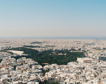 View of cityscape against clear sky