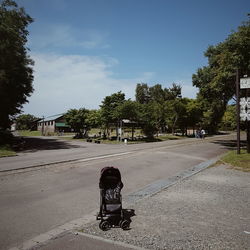 Man on road against sky