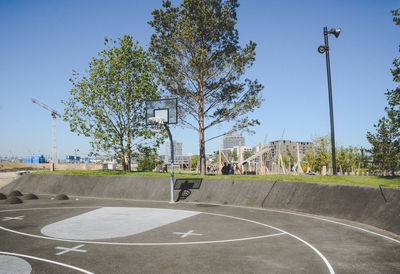 View of basketball court against clear sky