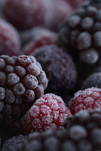 Frozen blueberries and raspberries, full frame