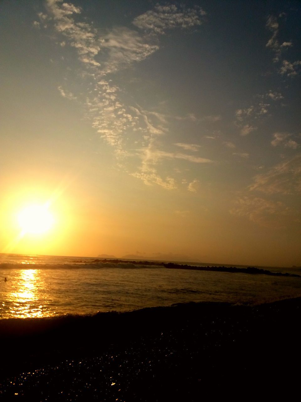 sea, sunset, horizon over water, water, scenics, beach, tranquil scene, beauty in nature, tranquility, sun, sky, shore, idyllic, nature, orange color, sunlight, reflection, silhouette, coastline, outdoors