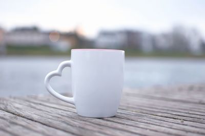 Close-up of coffee cup on table