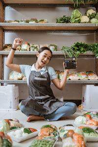 Portrait of cute girl holding food