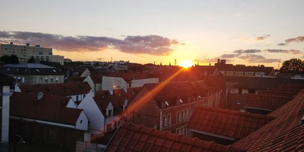 High angle view of townscape against sky during sunset