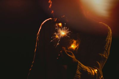 Firework display at night