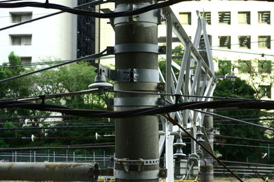 Low angle view of pipes in city