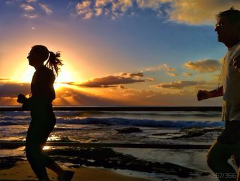 Scenic view of sea at sunset