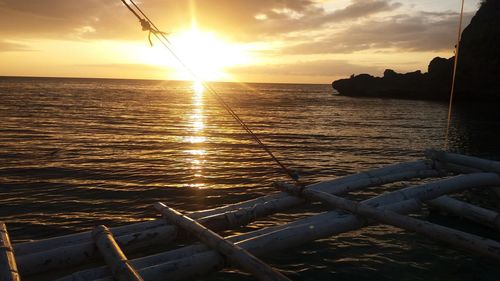 Scenic view of sea at sunset