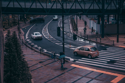 High angle view of vehicles on road in city