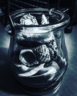 Close-up of drink in glass jar on table