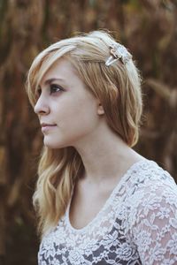 Close-up of thoughtful beautiful woman looking away