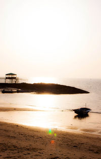 Scenic view of sea at sunset