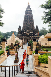 View of temple against building