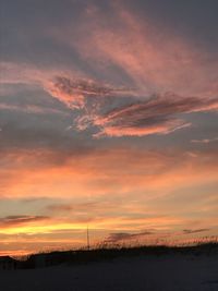 Scenic view of dramatic sky during sunset