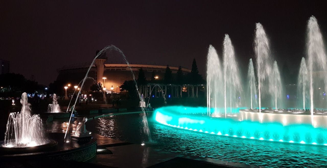 ILLUMINATED FOUNTAIN AT SWIMMING POOL