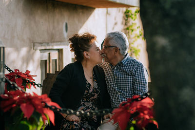 Senior latino mexican couple in love celebrate their anniversary