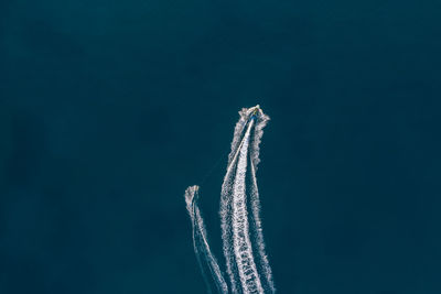 Low angle view of vapor trails in sky