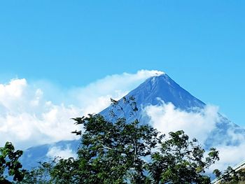 Scenic view of snowcapped mountain against sky