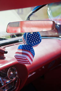 Close-up of red flag in car
