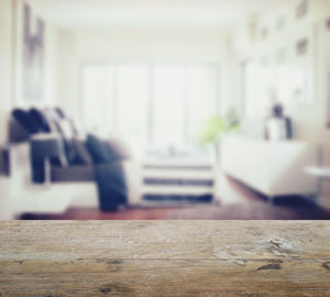 Man sitting on sofa at table