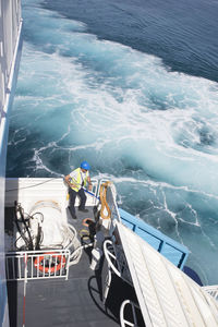 High angle view of sailboat sailing in sea