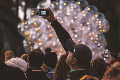 People photographing at night