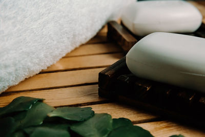 Close-up of soap on table with towel