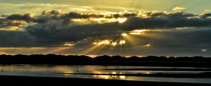 Scenic view of sunset over sea