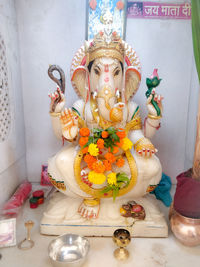 Buddha statue in front of temple