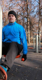 Man exercising at public park