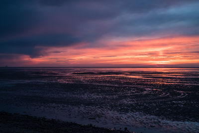 Scenic view of sea at sunset