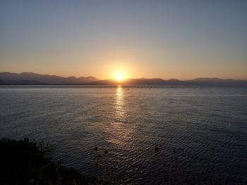 Scenic view of sea against sky during sunset