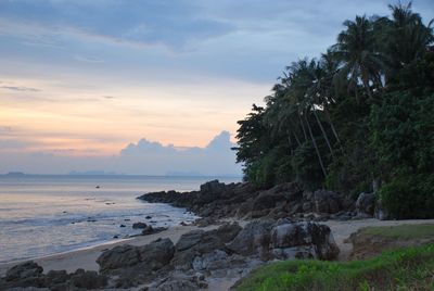 Scenic view of sea against cloudy sky