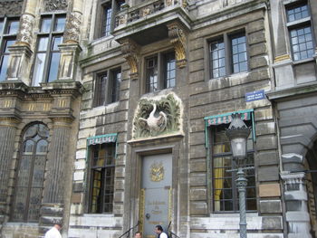 Low angle view of statue outside building