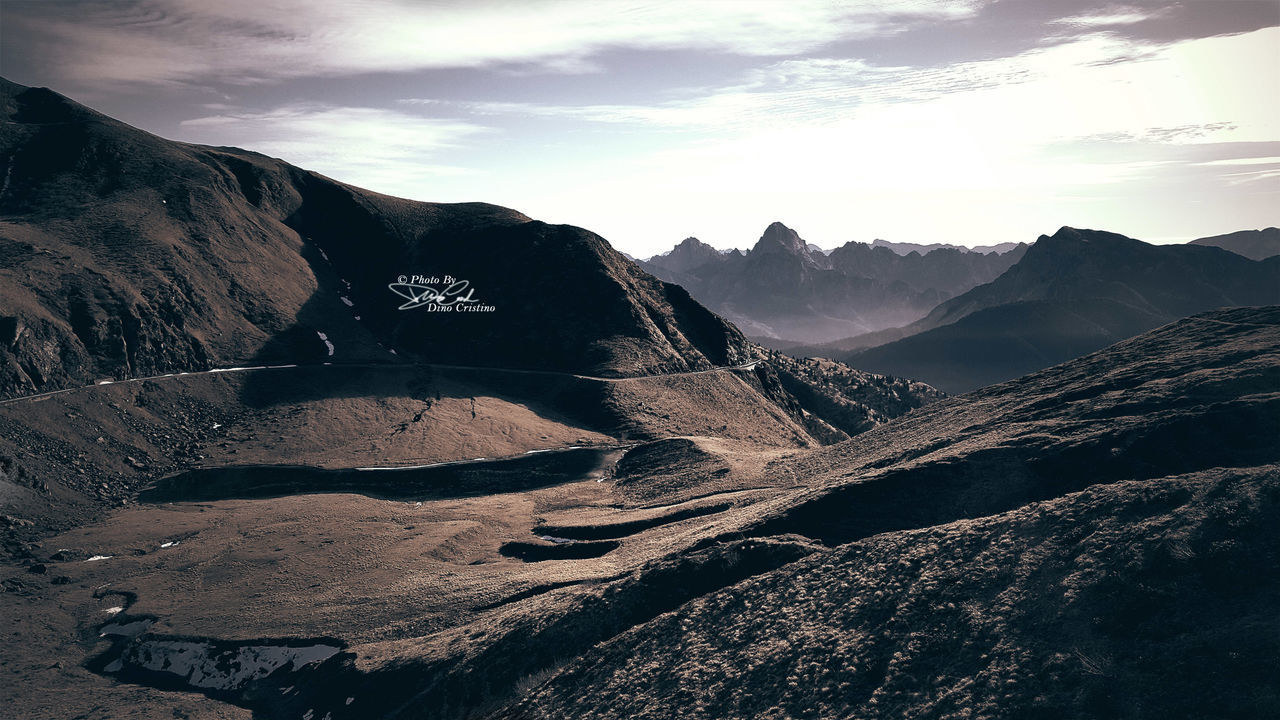 SCENIC VIEW OF MOUNTAIN AGAINST SKY