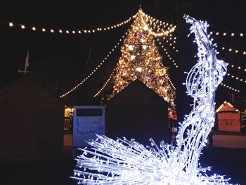 Illuminated christmas tree at night