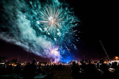 Firework display at night