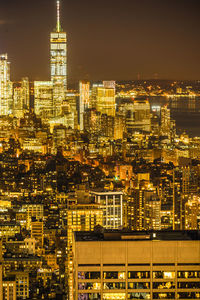 Illuminated buildings in city at night